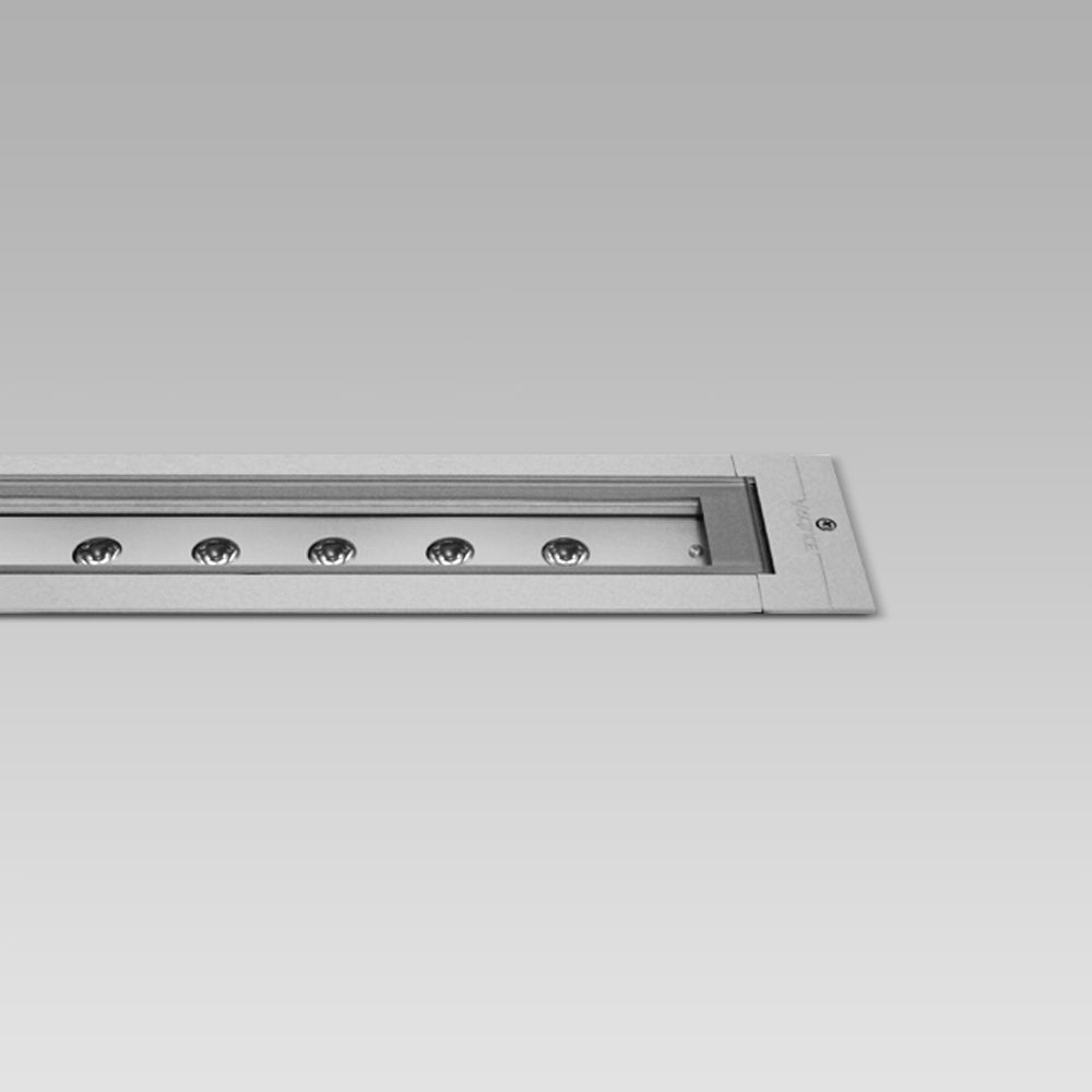 Recessed floor luminaires In-ground recessed luminaire with a linear design, for in-line installations, with many possible light beams and effects