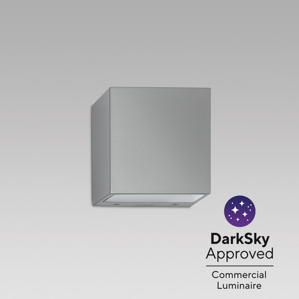 Wall and facade luminaires  Luminaire for facade lighting with bidirectional optic, featuring an elegant elliptic design