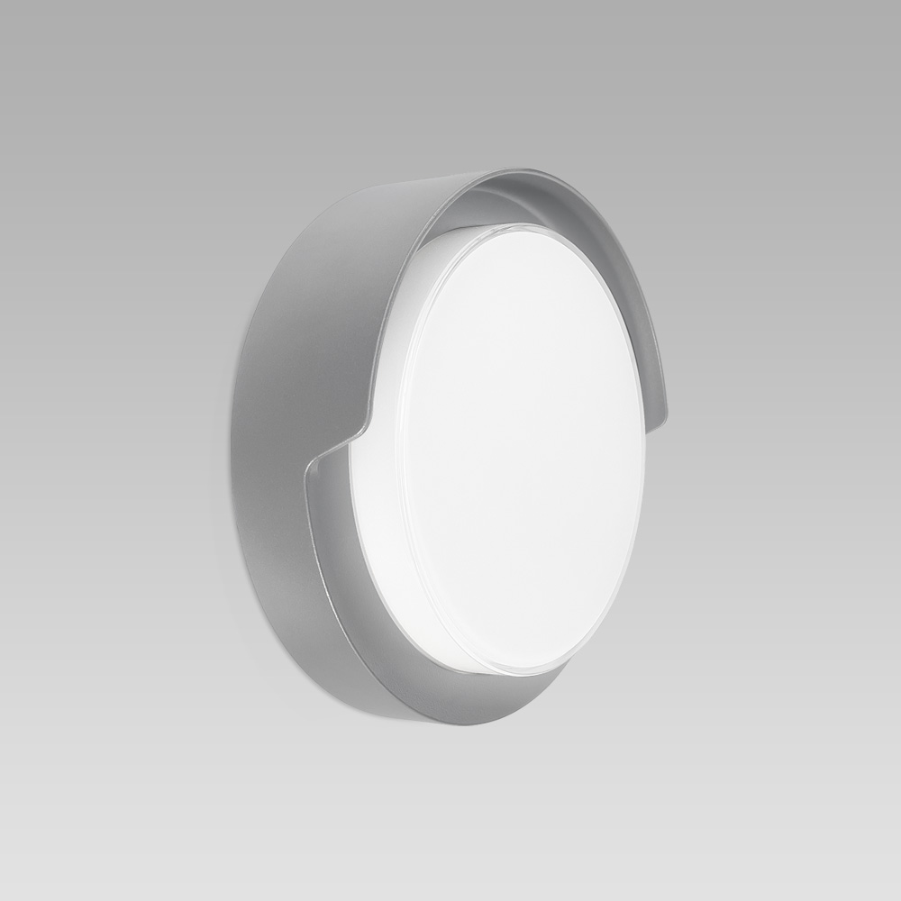 Compact-size and resistant ceiling or wall-mounted luminaire for indoor and outdoor lighting