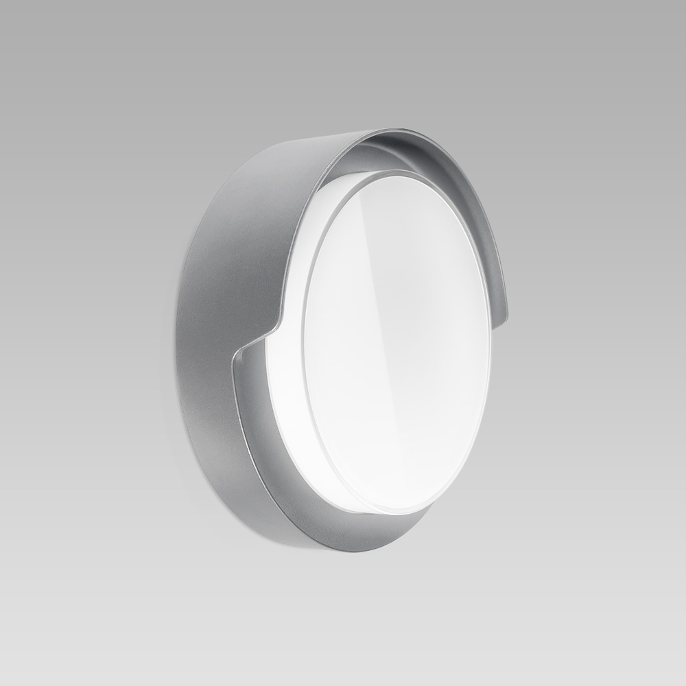 Compact-size and resistant ceiling or wall-mounted luminaire for indoor and outdoor lighting
