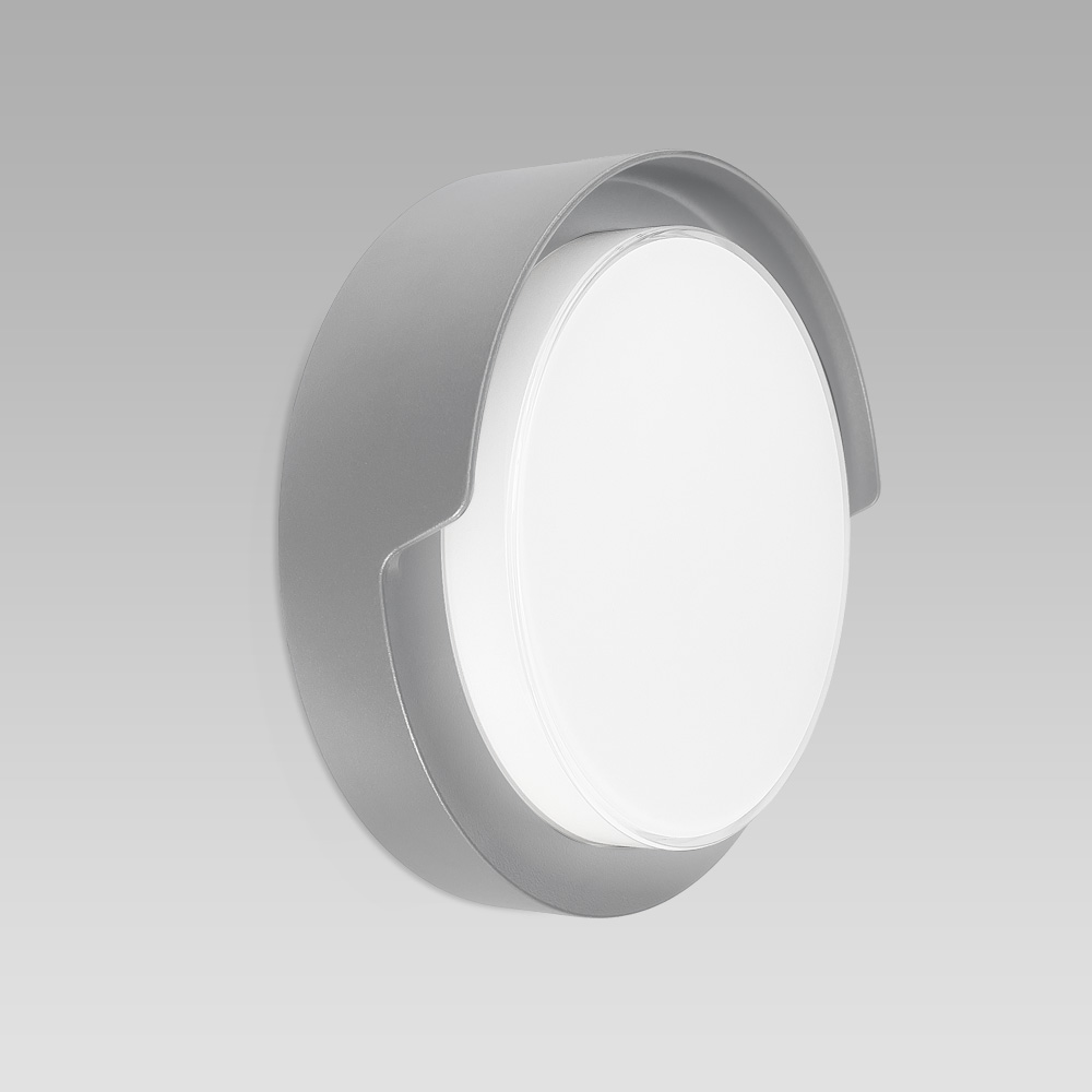 Compact-size and resistant ceiling or wall-mounted luminaire for indoor and outdoor lighting