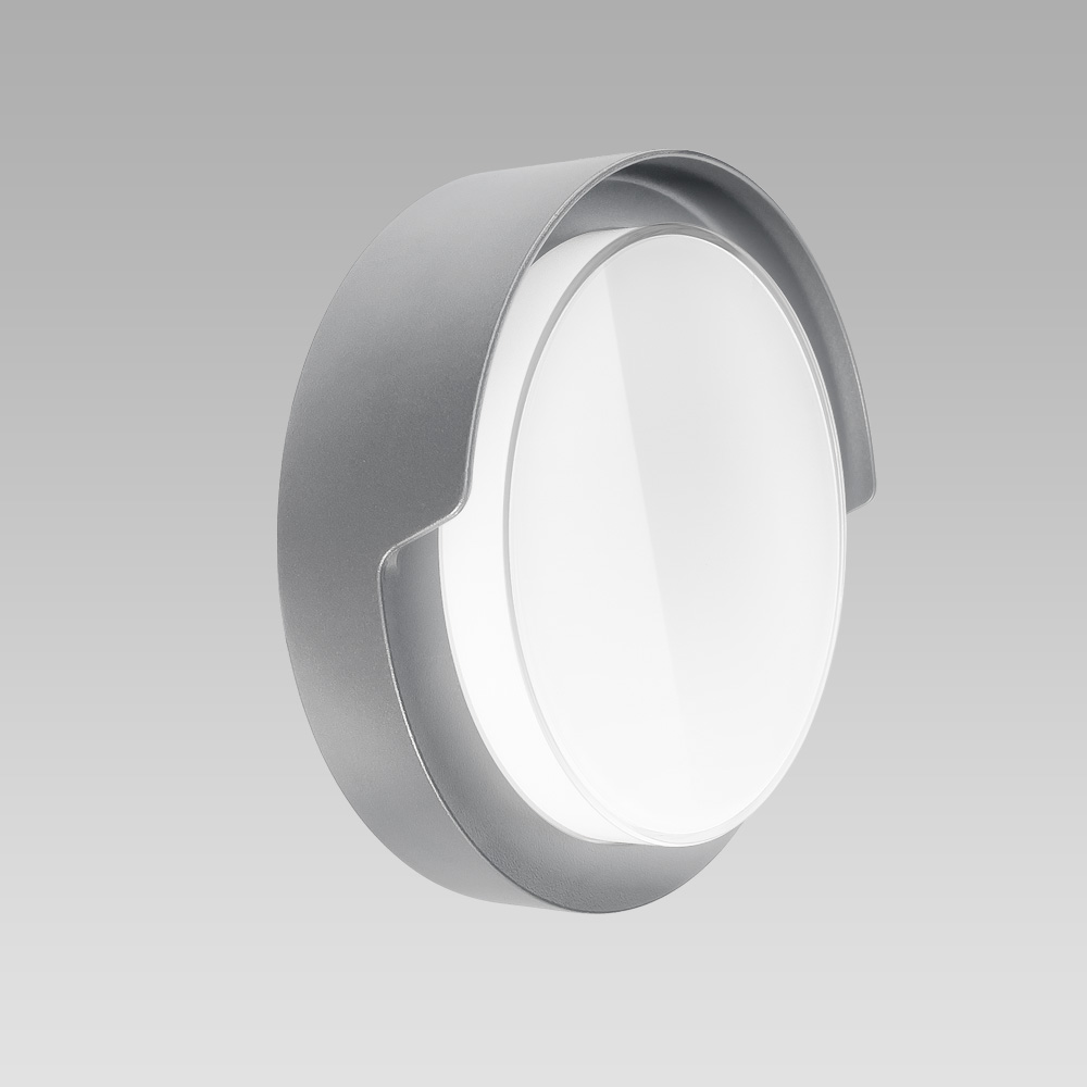 Compact-size and resistant ceiling or wall-mounted luminaire for indoor and outdoor lighting